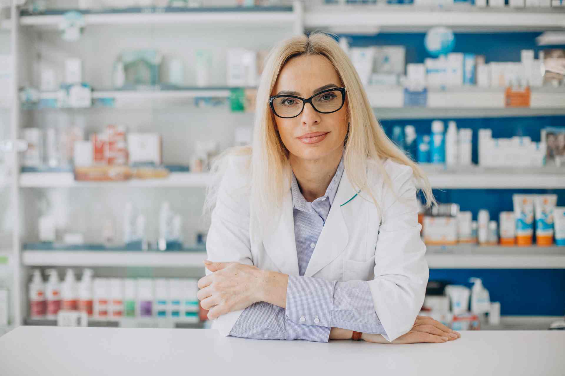 woman-working-pharmacy-wearing-coat